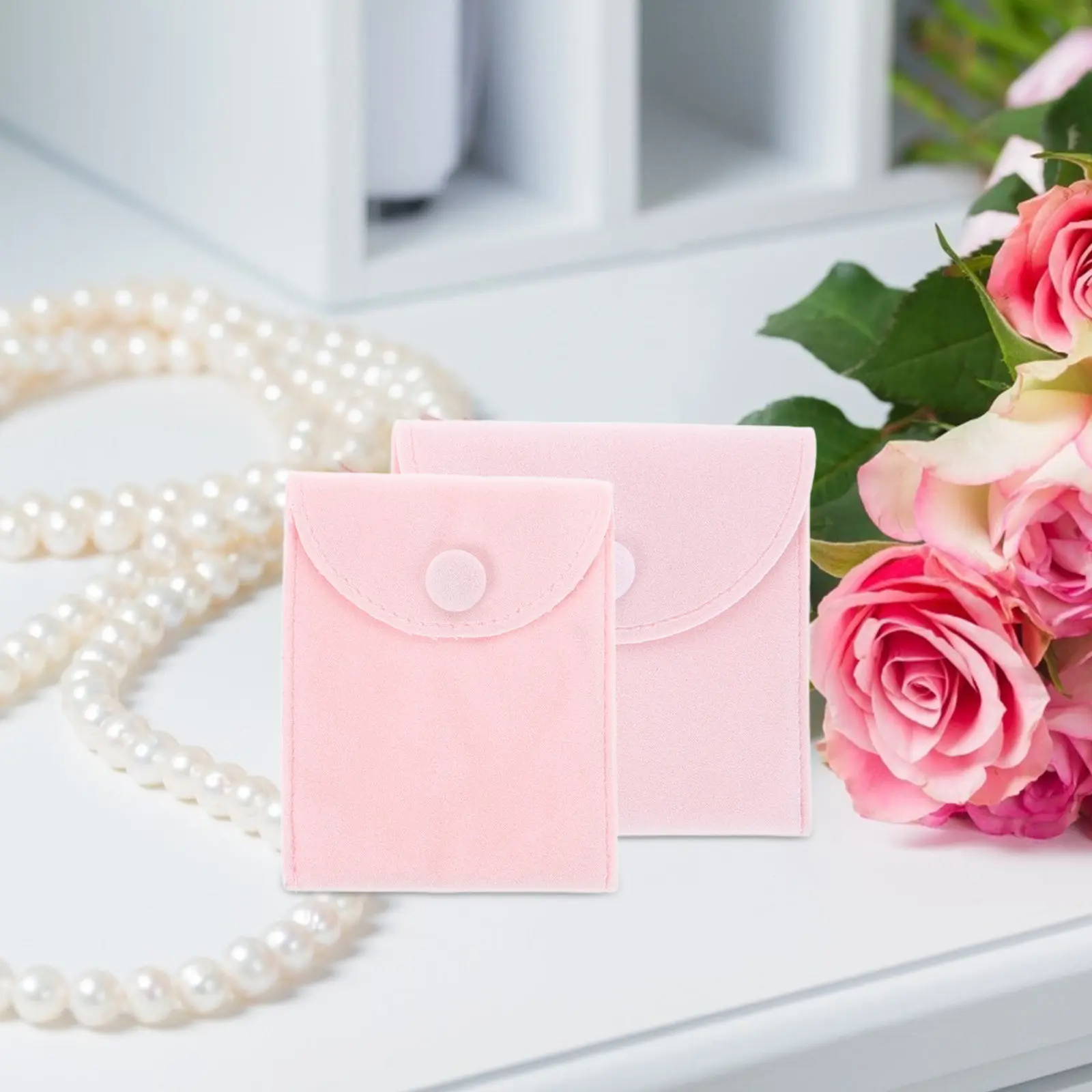 

Набор из 3-х мягких розовых дорожных мешочков-органайзеров на кнопках для ювелирных украшений: колец, ожерелий, браслетов