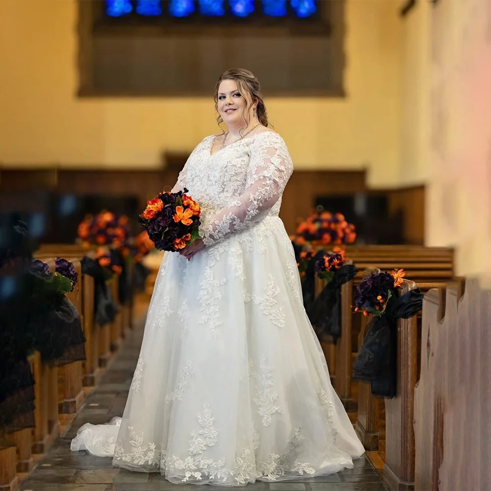 

Plus Size Wedding Dresses 2026 Luxury Long Sleeves V Neck Lace Appliques A Line Tulle Bride Ball Gown robe mariée Customized