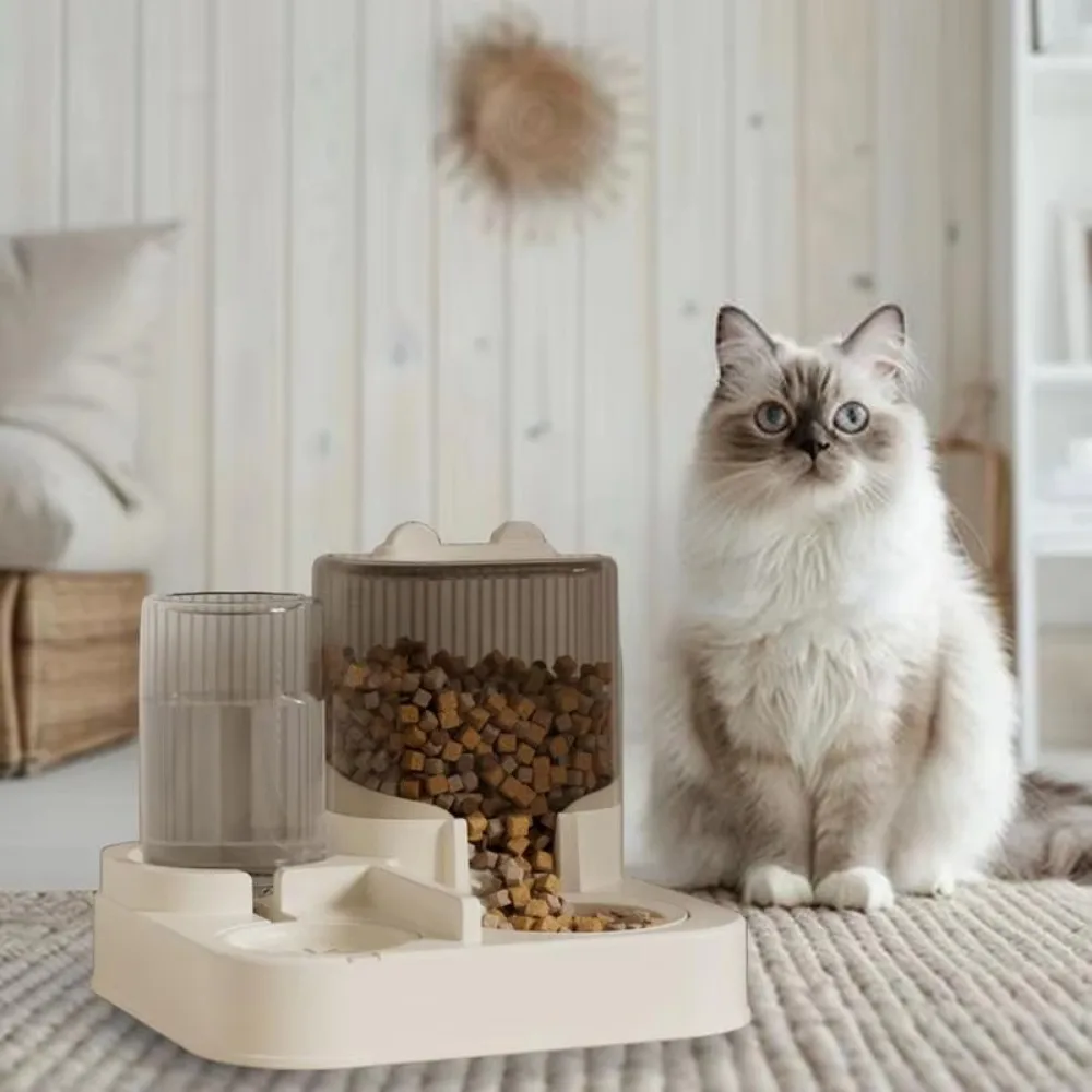 พร้อมชามอาหาร Cat เครื่องป้อนอัตโนมัติ เครื่องจ่ายน้ําสุนัขความจุขนาดใหญ่อัตโนมัติ เครื่องจ่ายอาหารสัตว์เลี้ยงแบบแห้งเปียกแยก