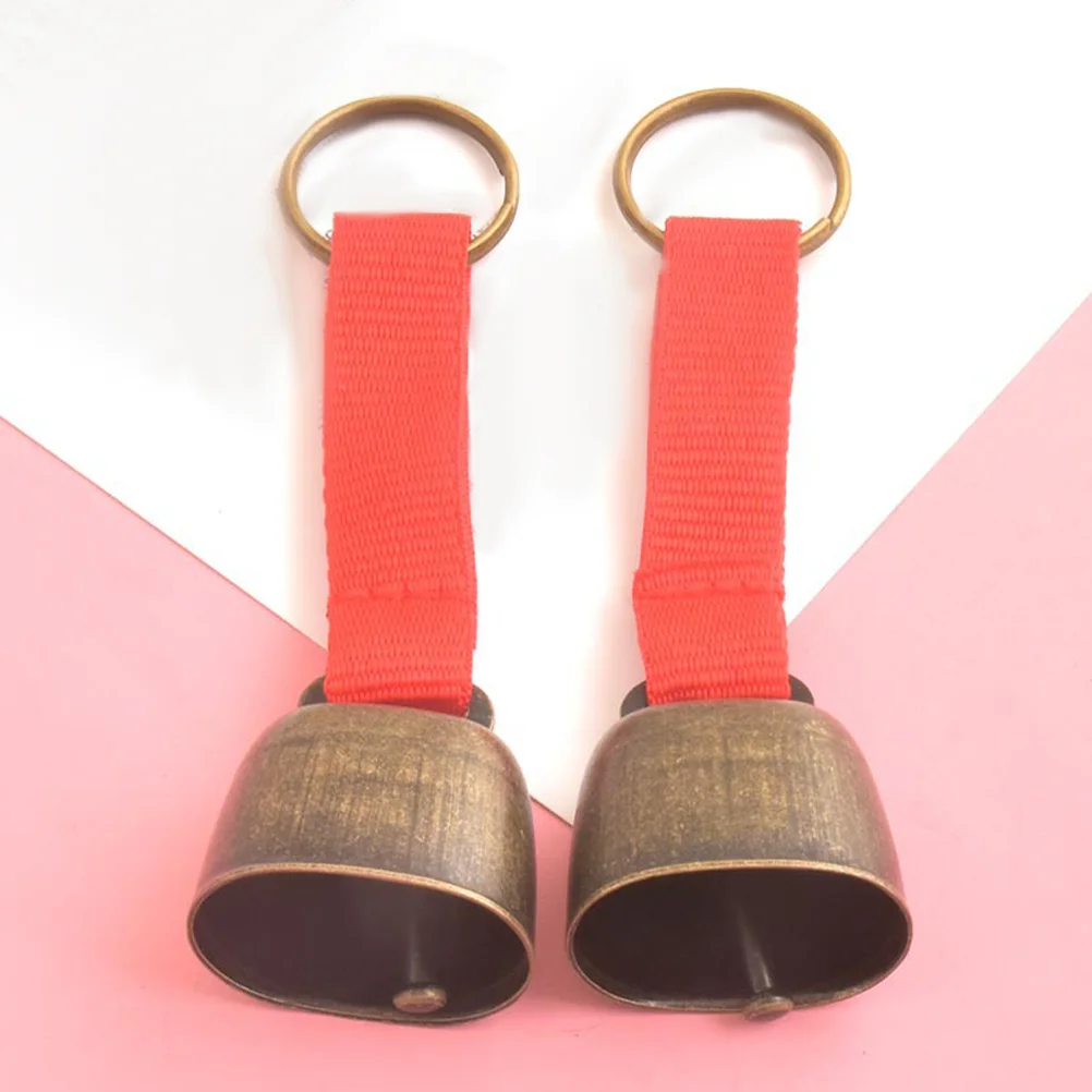 2pcs Camping ระฆังโลหะสําหรับ Camping กระดิ่งโลหะเดินป่า Cowbells นกหวีดกลางแจ้ง COW Bells สําหรับสัตว์เลี้ยงขนาดเล็กน้ําหนักเบา