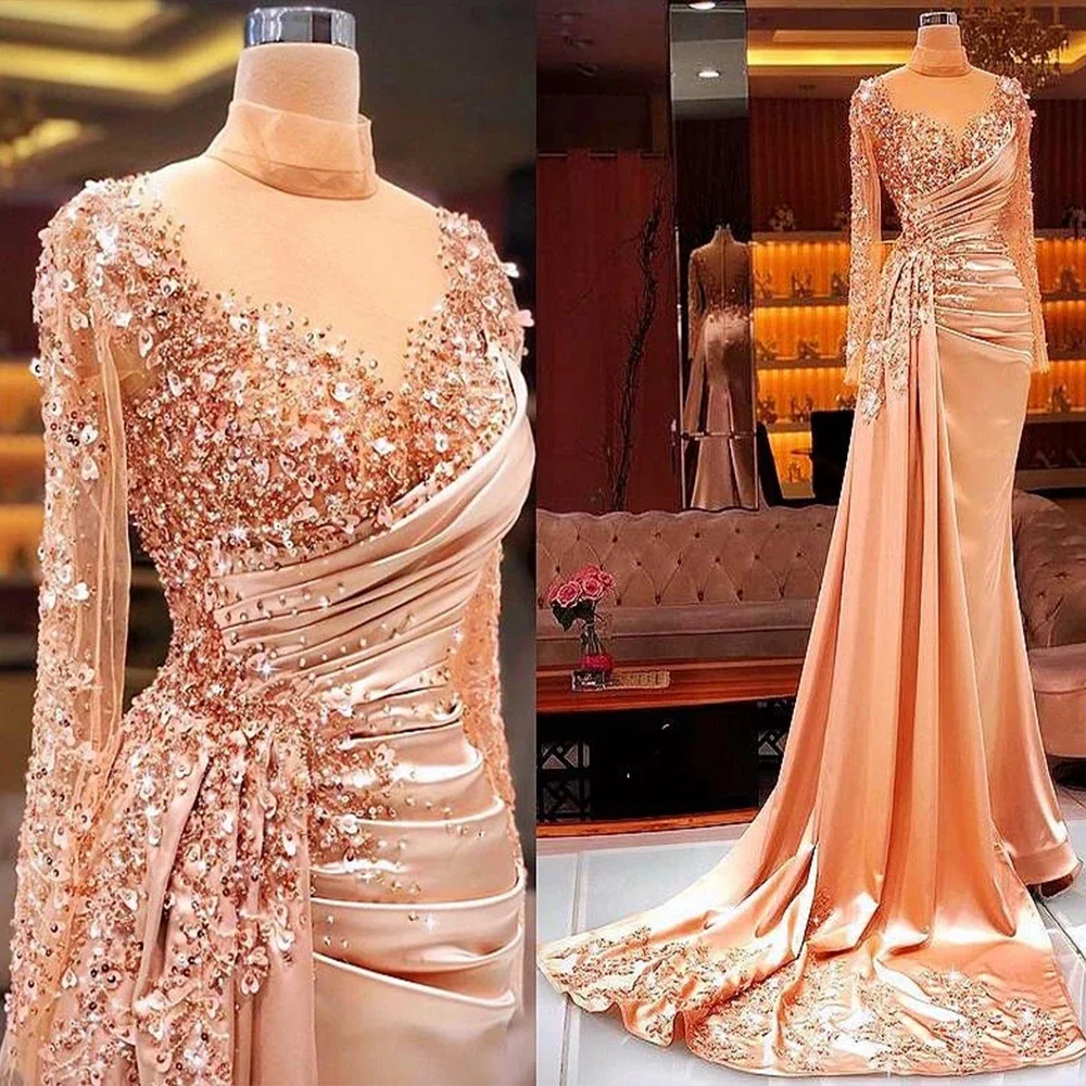 

Plus Size Mermaid Sexy Prom Dresses Sheer Neck Beaded Sequins Arabic Aso Ebi Blush Pink Long Sleeve Evening Gowns