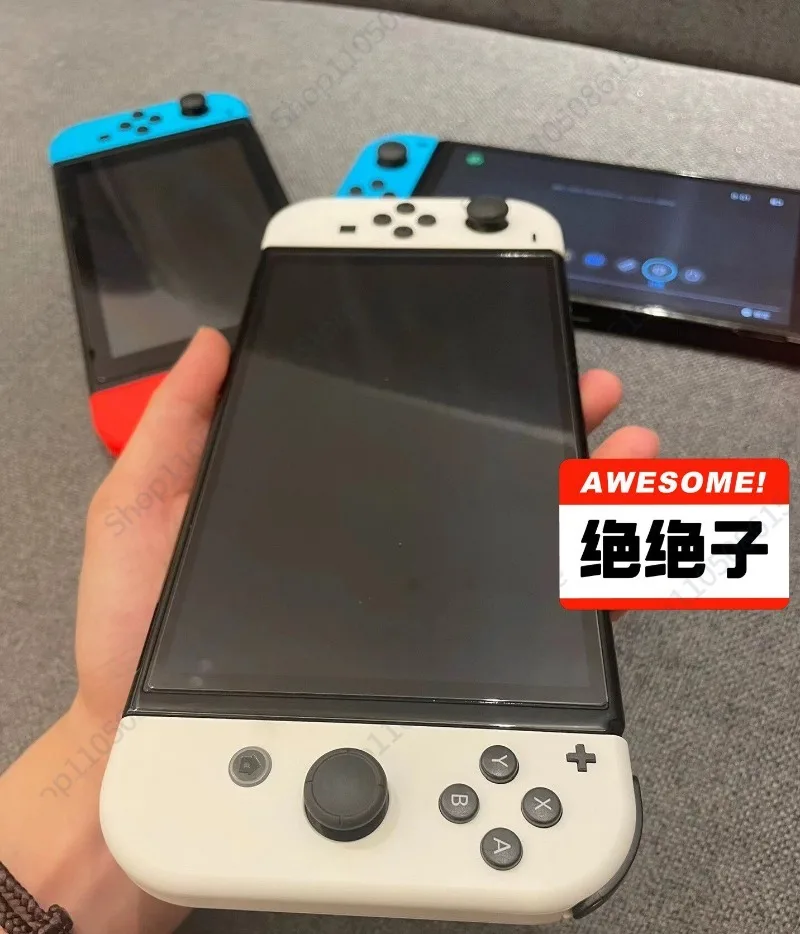 

Игровая консоль с OLED-экраном, длительным временем автономной работы, двойной системой, бесплатными играми, японской и гонконгской версиями, полным набором игр.