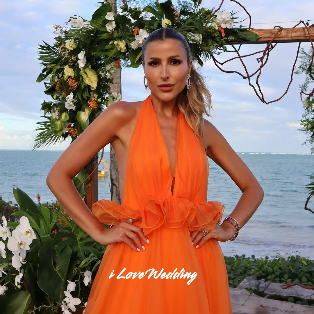ชุดเดรสออกงานสีส้ม คอวี สายคล้องคอ แขนกุด ระบาย ทรงเอ หลายชั้น ยาวกรอมพื้น จับจีบ ชุดงานแต่งงาน งานเลี้ยง สามารถสั่งตัดได้