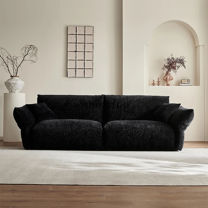 

Small apartment straight row three-person puff sofa black