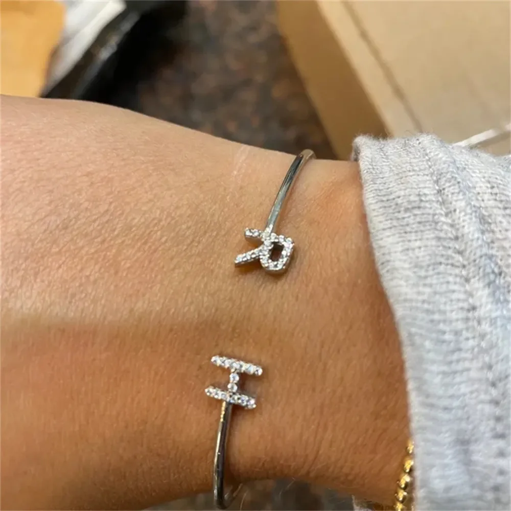 

Haomi 2026 Custom letter bracelet with zircon inlay 26 letter bracelet customisable for children and adult sizes