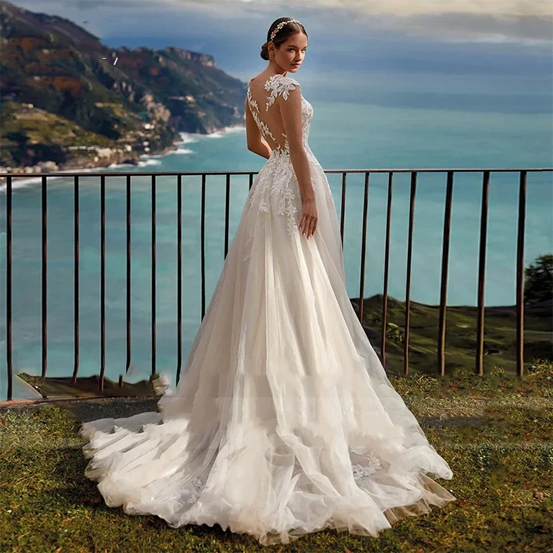 Flavinke カスタマイズされたボヘミアン A ラインのウェディングドレスオーガンザレースの花嫁ドレス O ネックノースリーブアップリケ夜会服ローブデマリー