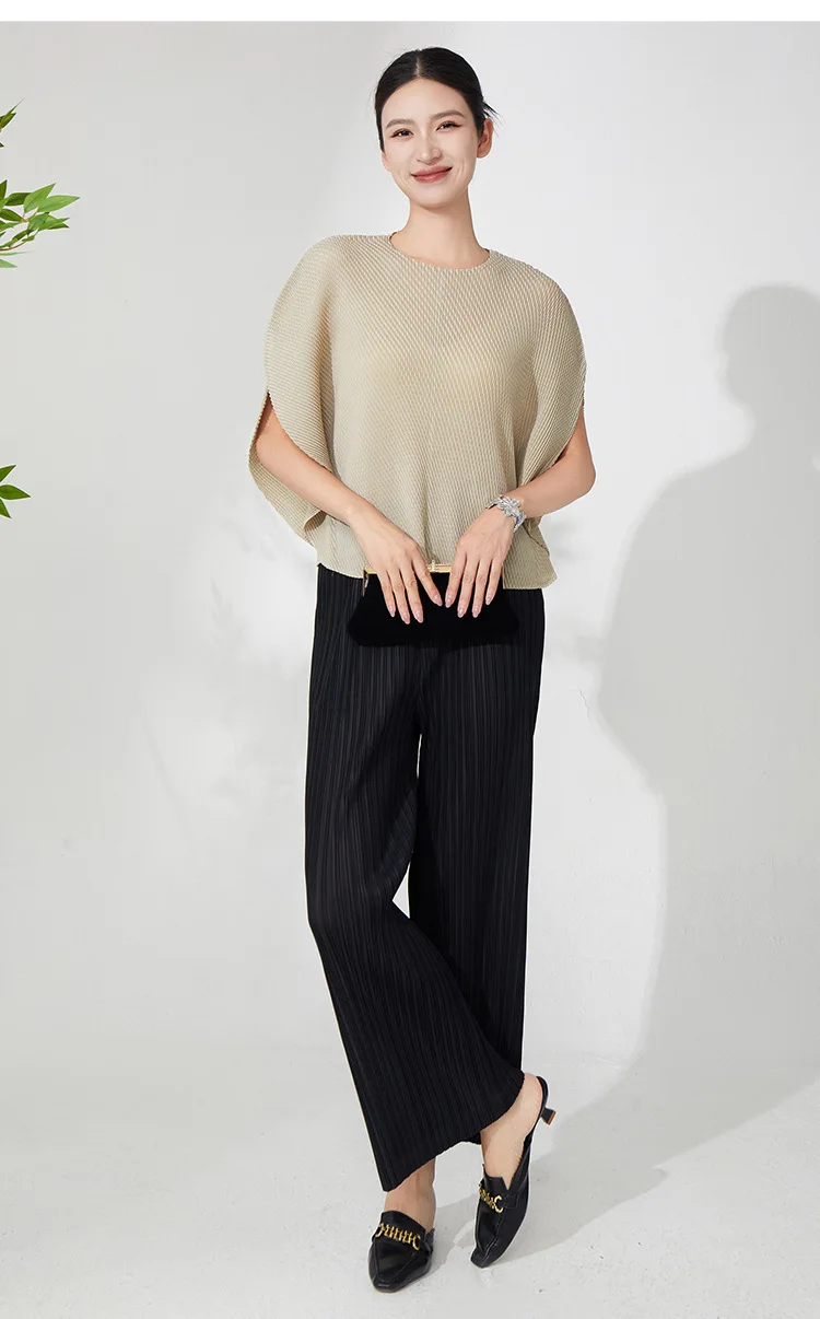 Plisowana damska koszulka T-shirt Jednolity kolor Okrągły dekolt Nieregularny krój Luźna Elastyczna Codzienna Elegancka Damska Bluzka Nowość Lato 2025