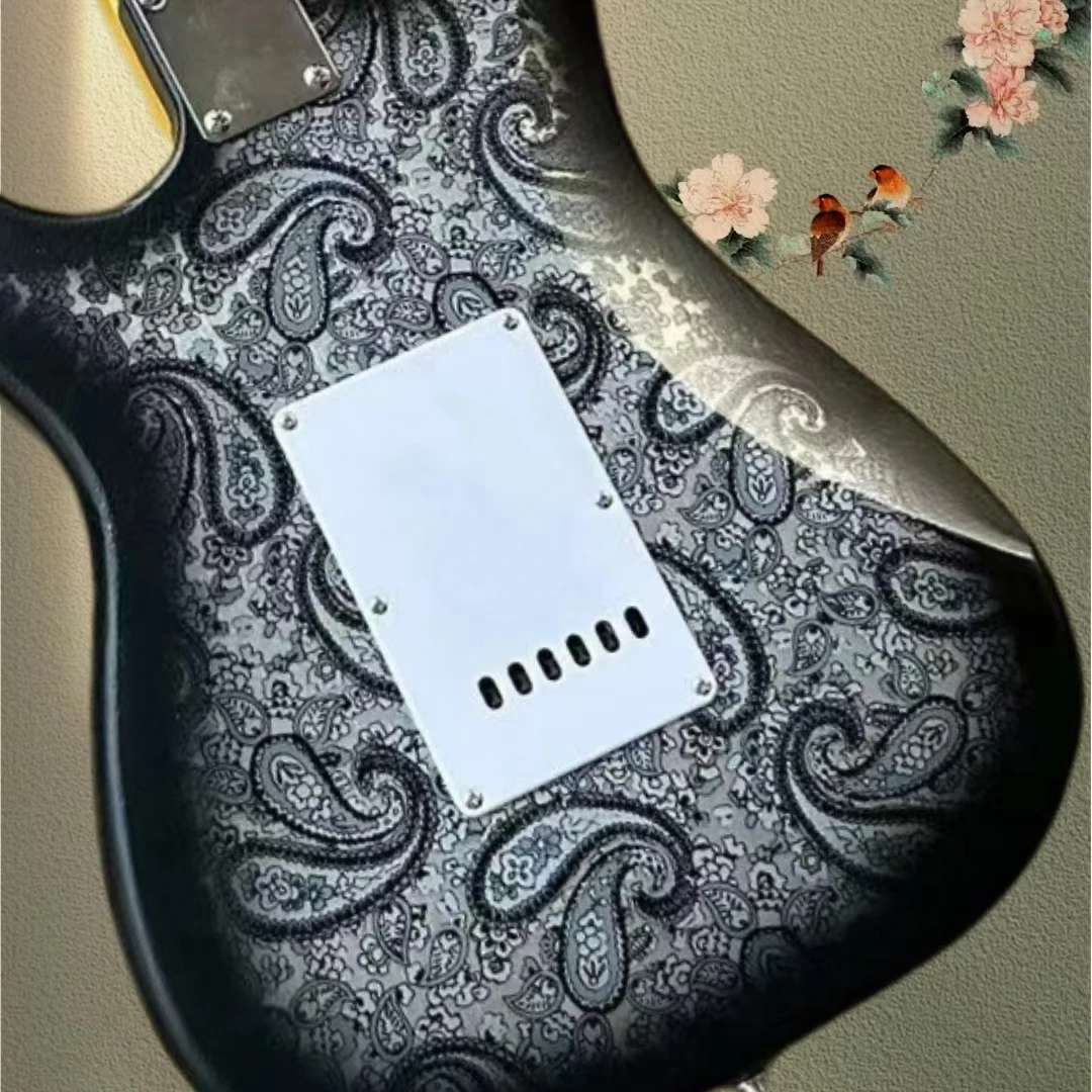 Heirloom coral electric guitar, Paisley gray decal