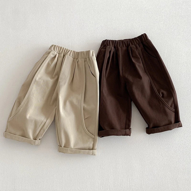 

Новые весенние повседневные брюки в корейском стиле для детей 2026 года, свободные повседневные брюки для девочек и мальчиков, однотонные хлопковые брюки для детей
