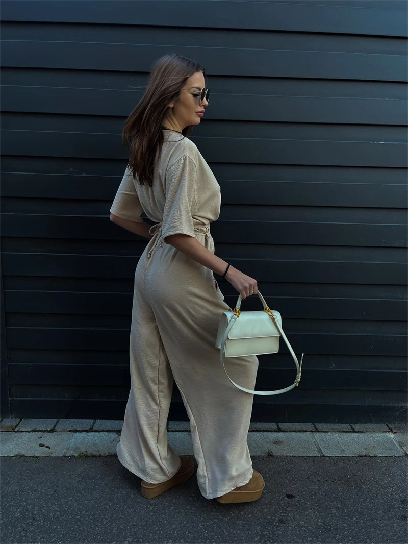 気質通勤レディースジャンプスーツ2025夏新作無地タイウエストディープVネックカジュアルジャンプスーツワイドレッグパンツ