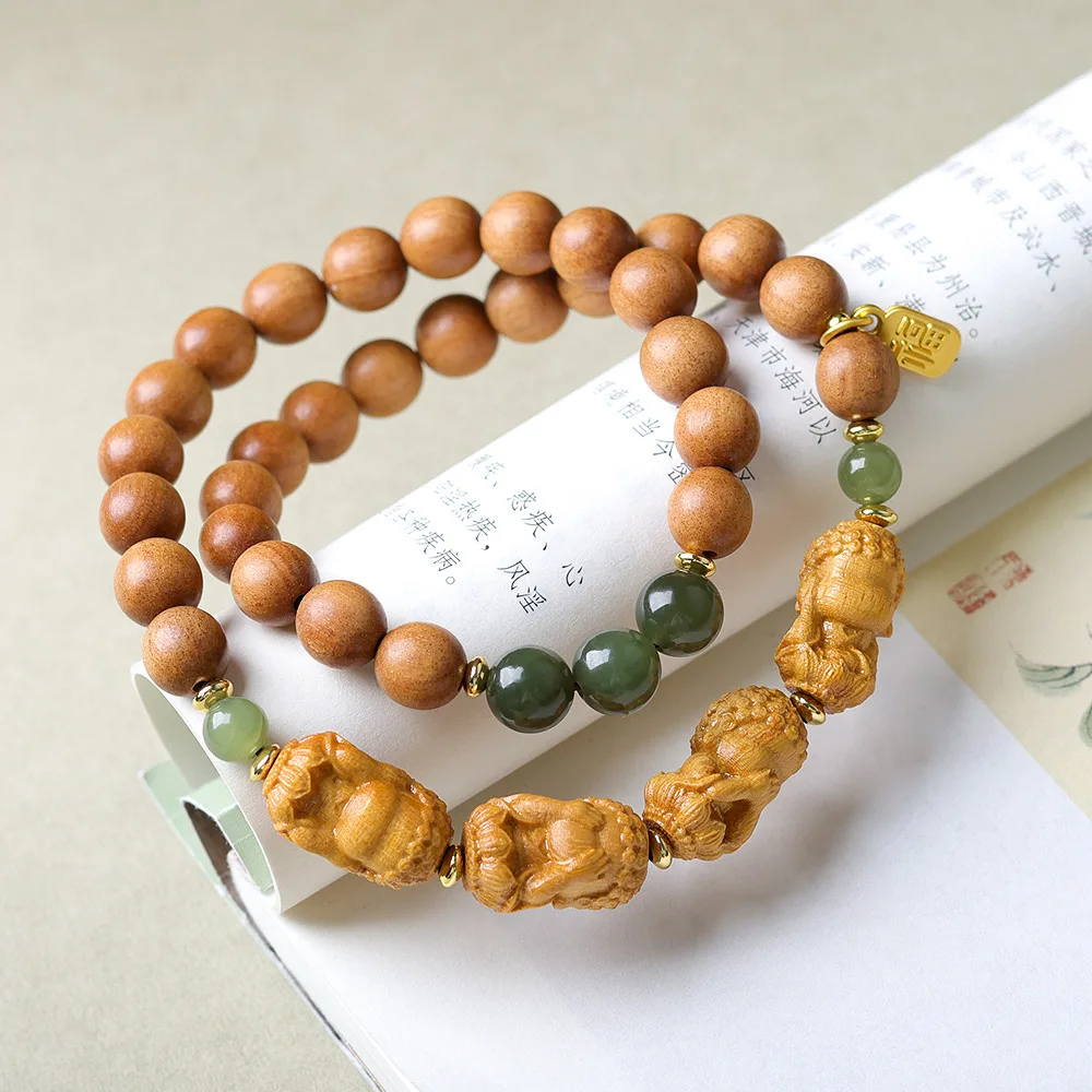

Sandalwood double-ring bracelet play four not Buddha Chinese and field jade string beckoning cat fortune fortune transfer and
