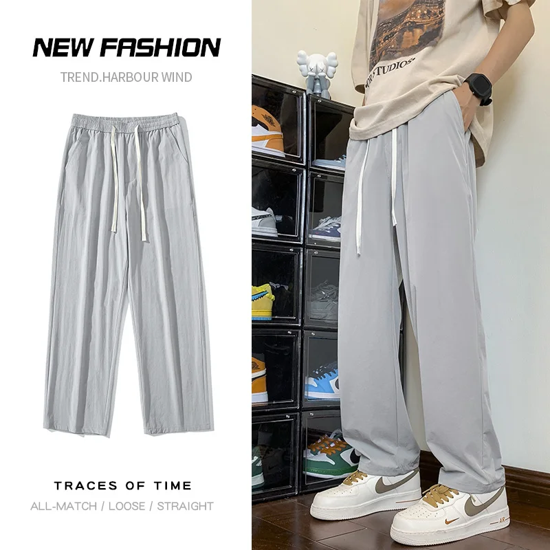 

2023 Summer New Men's Baggy Casual Pants Street Fashion Loose Fitting Quick Drying Pants Jogging Sports Pants Black Grey