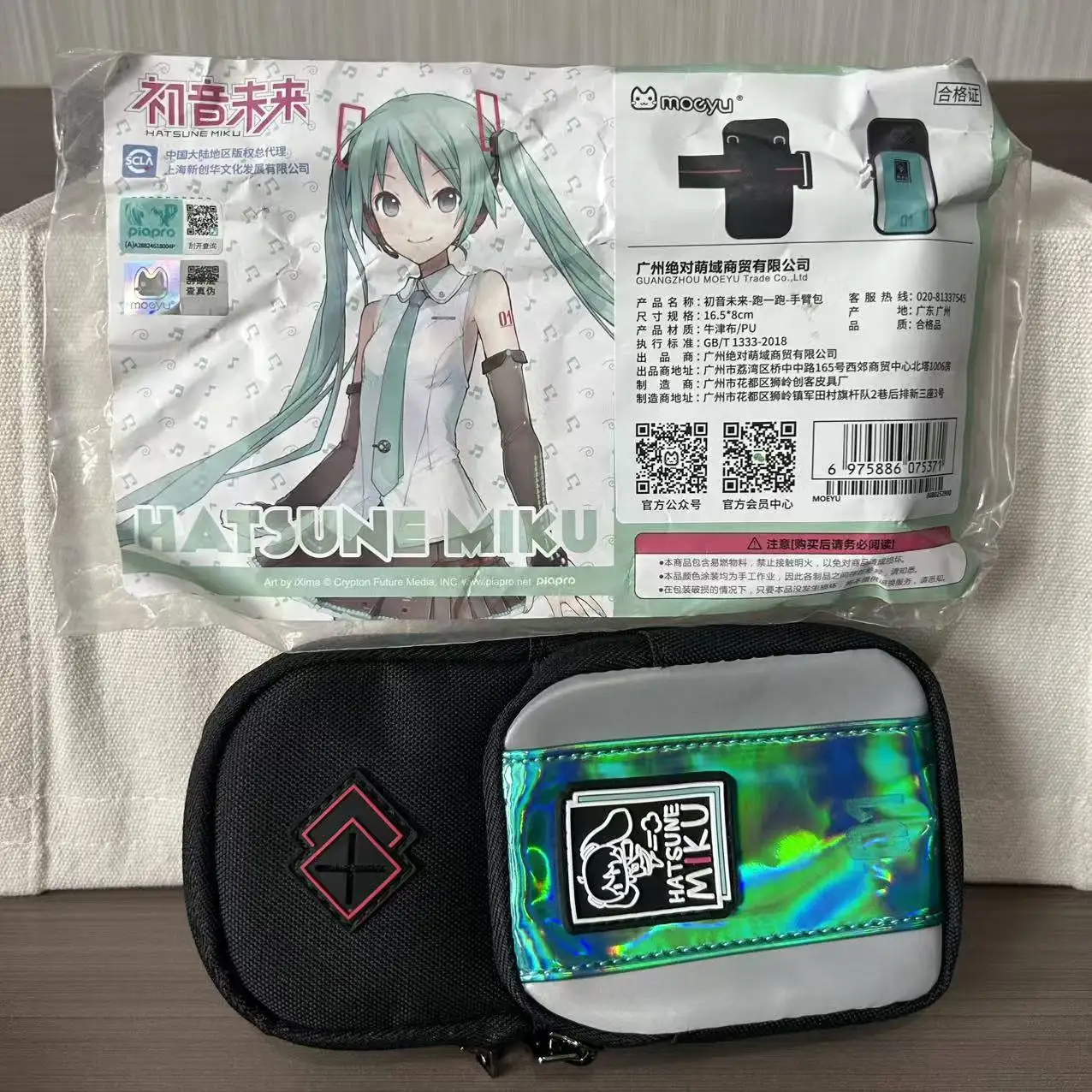 

In stock New Anime Hatsune Miku Kawaii Figure Model running armband phone pouch Toys Doll Gifts