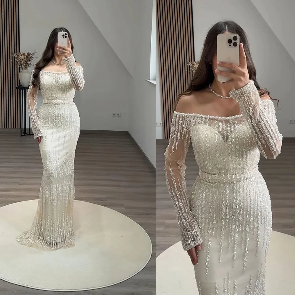 فساتين حفلة موسيقية رائعة بياقة قارب من التول وأكمام طويلة مع ترتر غمد بطول الأرض بدون ظهر للنساء