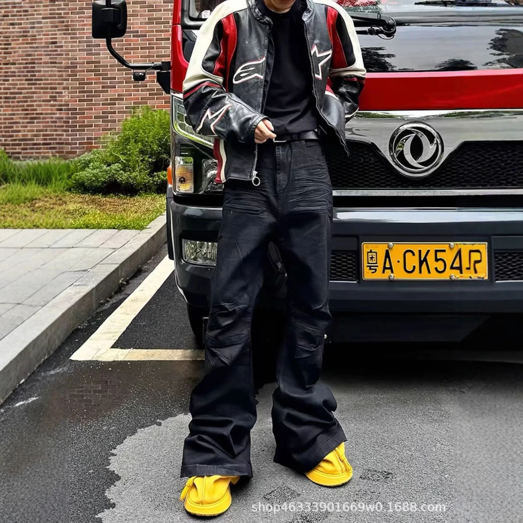 

Rick RO hand-brushed black rubber-coated micro-ruffled men's slim BootCut tapered floor-length trousers