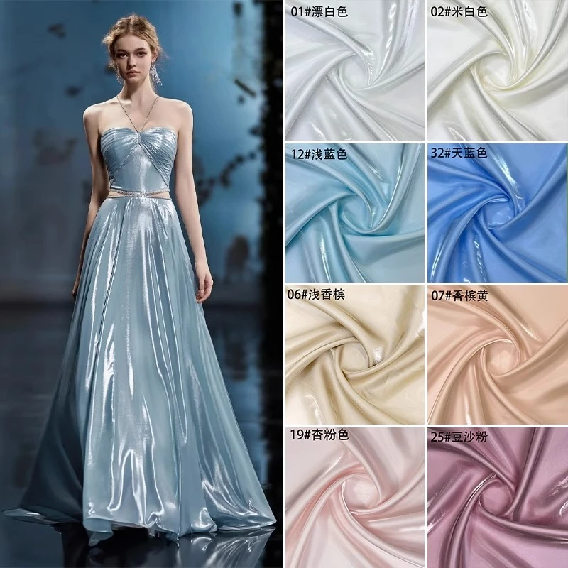 

Super Bright Liquid Water Gloss Satin: Smooth Supportive Stiff Fabric for Dresses, Performance Costumes, Pants