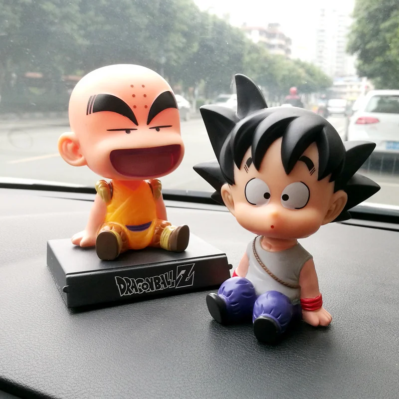 Dragon ball z bonecas suporte de telefone anime figura son goku kuririn balançando a cabeça bonecas ornamentos carro acessórios crianças brinquedos