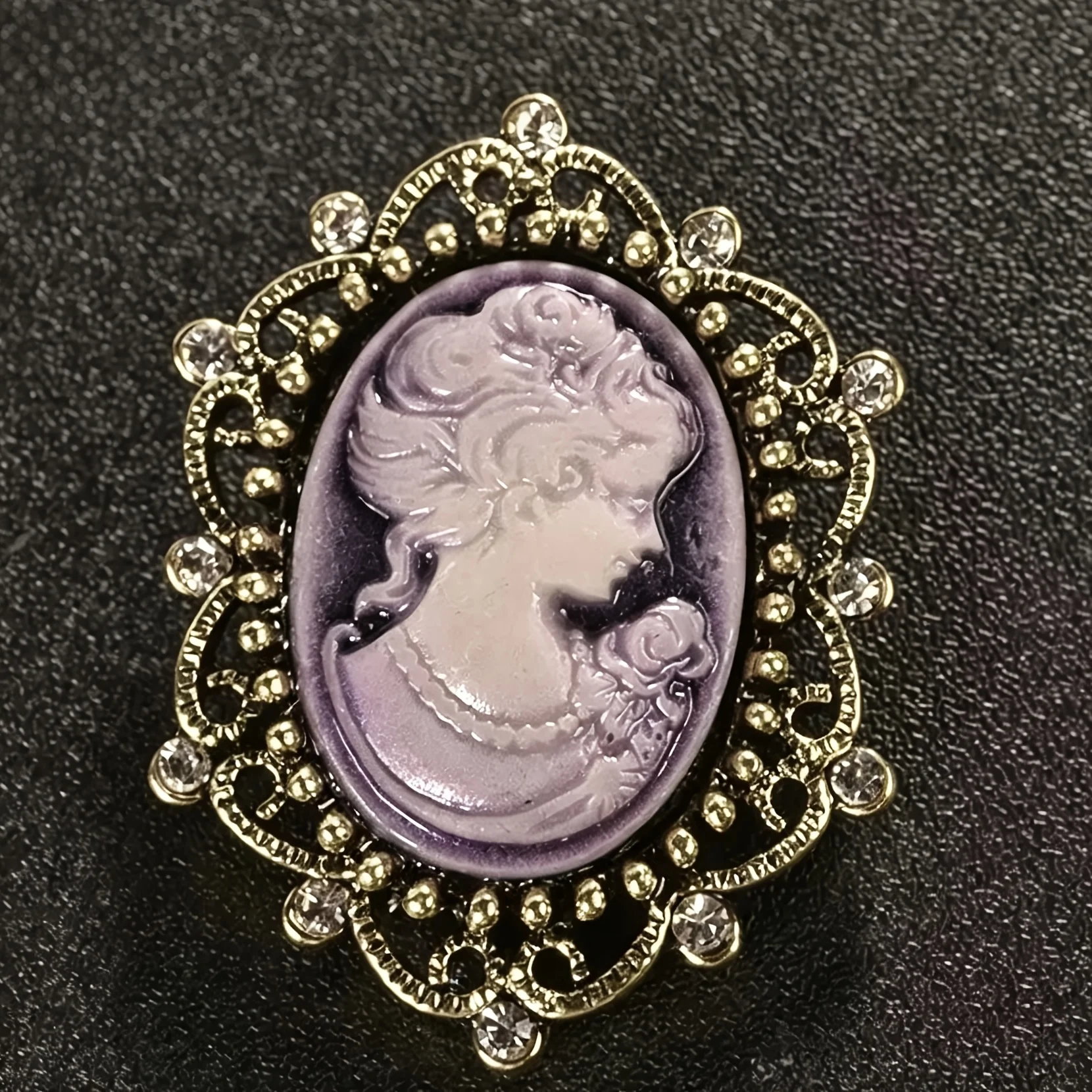 Vintage-Style Cameo Brooch, Crafted With An Antiqued Gold-Tone Openwork Design. A Victorian-Inspired Statement Piece Suit