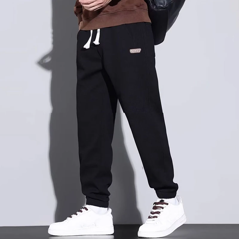 الرجال Sweatpants الربيع التطريز الرباط السراويل الفضفاضة الرياضة اللياقة البدنية عداء ببطء الشارع الشهير في الهواء الطلق تشغيل الرجال السراويل حجم كبير