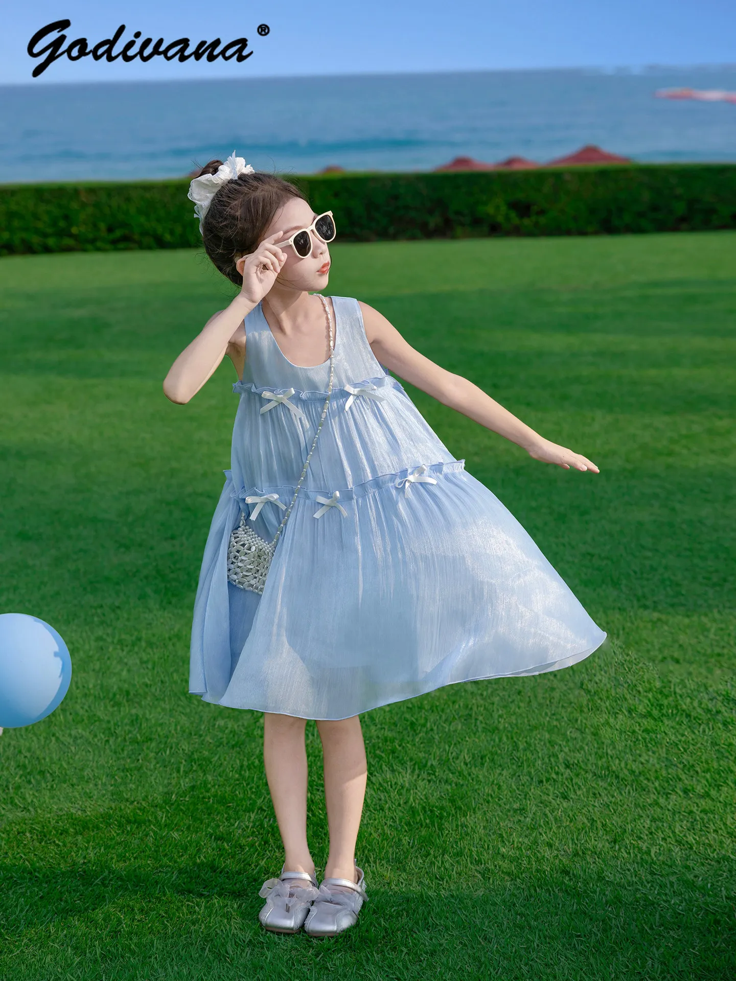 Sweet Baby Girls Summer 2026 New Fashion Sundress Kids Elegant Blue O-neck Sleeveless Loose Fit Bow Casual Suspender Dresses