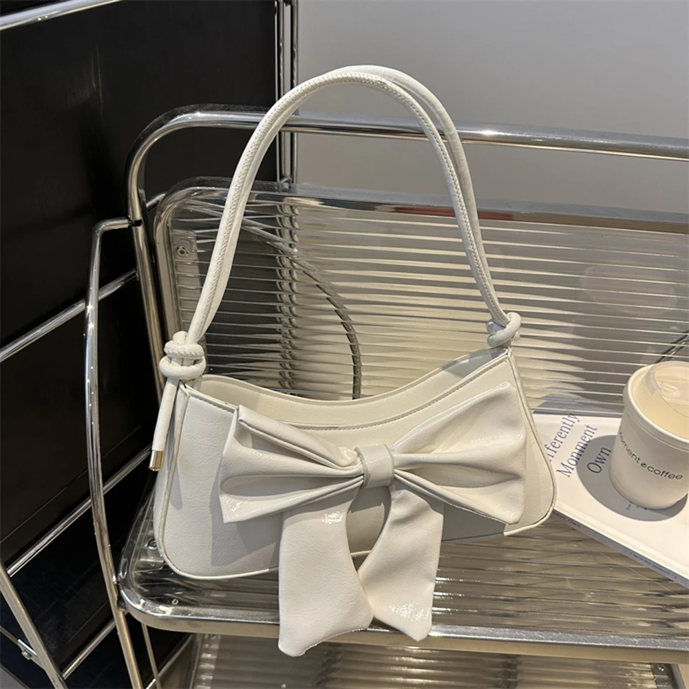 Śliczna kokardka Decor mała torebka PU skórzana słodka torebka z regulowanym paskiem kopertówka modna torba Crossbody dla kobiet