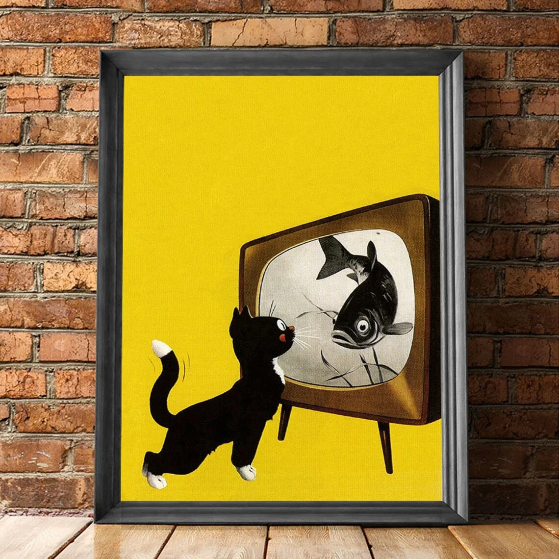 Mid-Century Modern Cat & TV Wall Art - Playful Graphic Print of a Curious Black Cat Staring at a Fish on a Retro TV, Bold Yellow