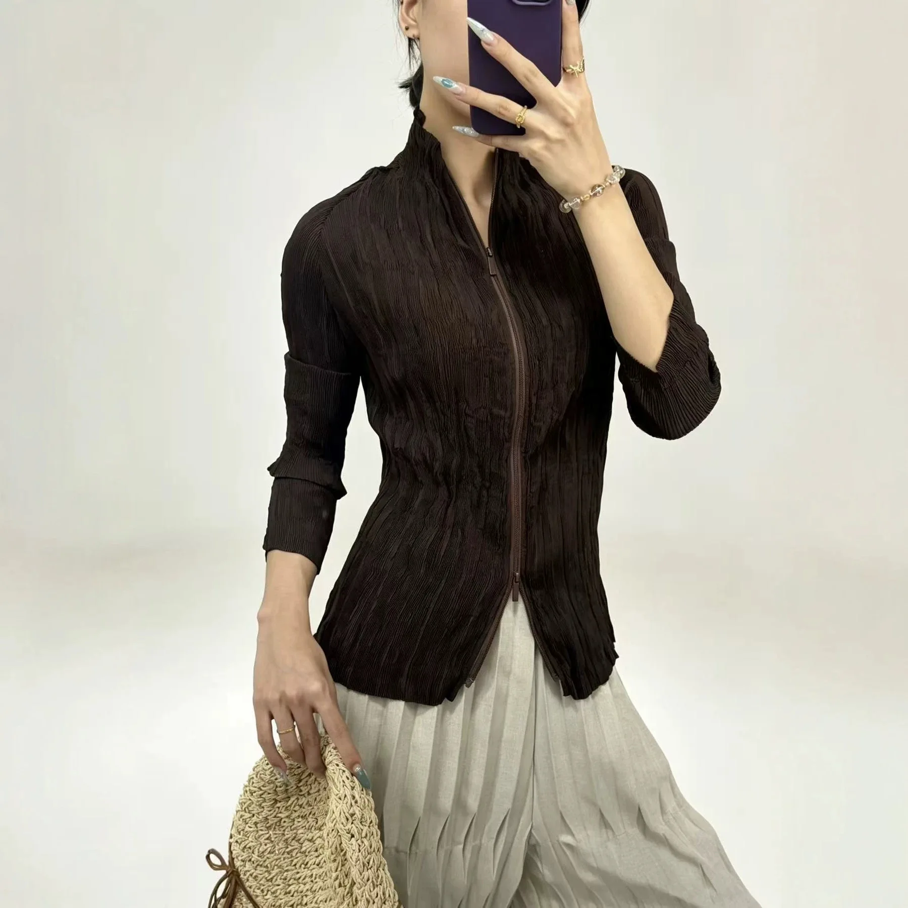 Miyake‑Inspired Twisted Pleated Zip Jacket Women Stand Collar Long Sleeve Slim Fit Wrinkle‑Resistant Irregular Hem Casual Coat