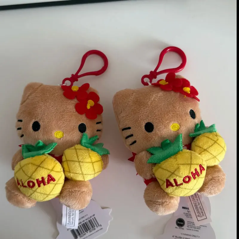 Para Kawaii HelloKitty 50 aniversario hawaiano piel negra piña serie anillo de natación muñeco de peluche mochila decoración colgante