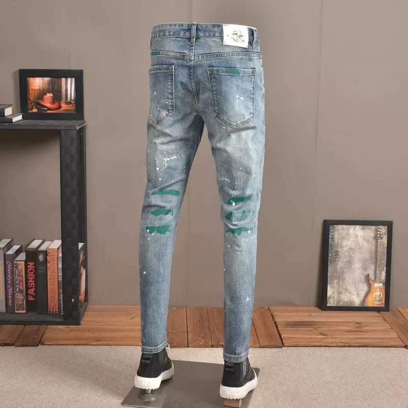 Autumn Men Light Blue Ripped Jeans Streetwear Casual Slim Fit Pencil Pants Fashion Graffiti Printed Patch Denim Trousers CP2020