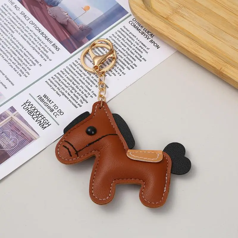 Heißer Verkauf: Niedlicher Leder-Pony-Schlüsselanhänger, Cartoon-Stil, süßer Tierkreis-Pferde-Anhänger, Auto-Schlüsselring, Rucksack-Deko, Neujahrsgeschenk
