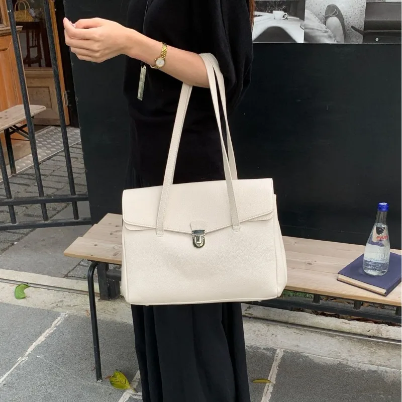 Stylish Shoulder Bag For Women By Famous Designer, Premium Leather Construction With Inner Pockets, Elegant And Practical Choice