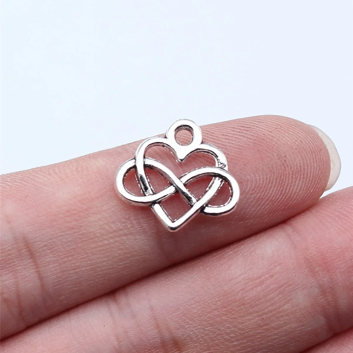 WYSIWYG 40 sztuk 15x14mm antyczne srebro kolor nieskończoności Symbol serce Charms wisiorek dla DIY tworzenia biżuterii komponenty rzemieślnicze