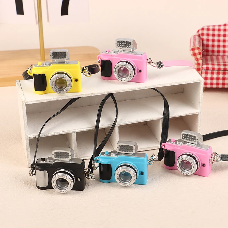 1pc mini boneca câmera modelo com flash cordão de couro ídolo boneca câmera diy casa de bonecas brinquedo plástico vestir-se acessórios