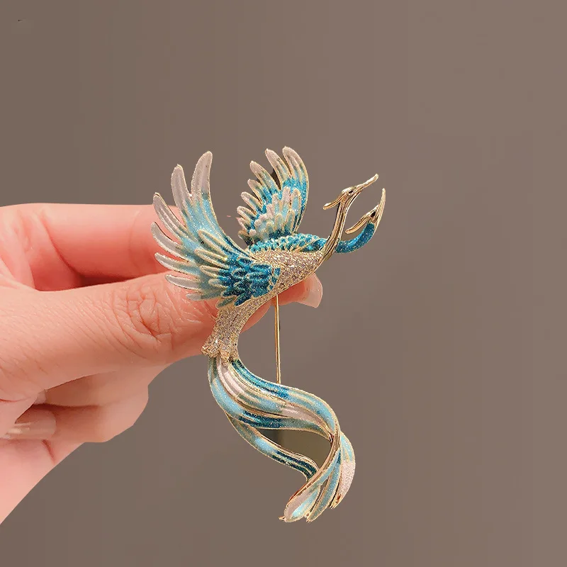 Broche phénix haut de gamme de style chinois pour femme, luxueuse et élégante avec un charme de personnalité unique.