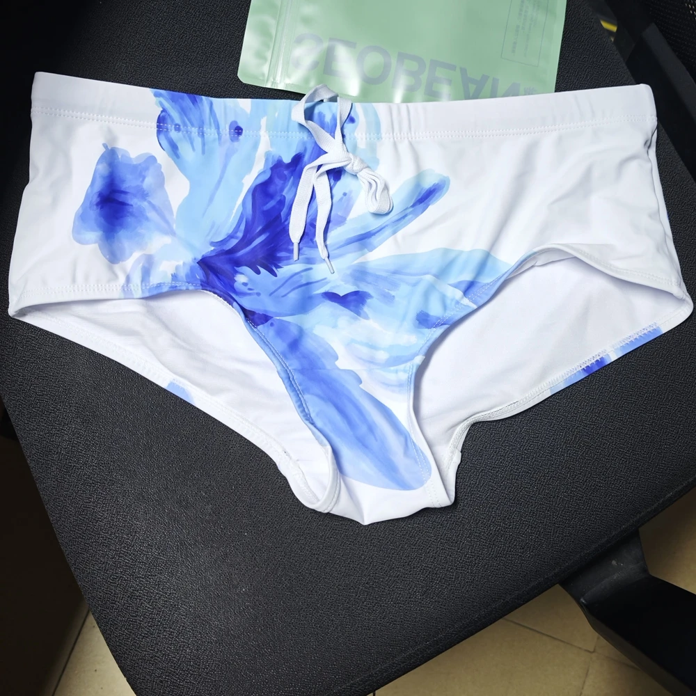 2026Men's new Japanese simple covered boxer swimming trunks blue and white trend European and American beach boxers UXH606-1