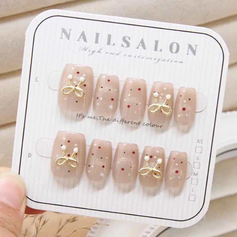 10 ชิ้นน่ารักการ์ตูนหัวใจสีทองและสุนัขกดบนเล็บสไตล์ฝรั่งเศส Polka Dot Bowknot เล็บที่ถอดออกได้ Cat Eye Design เล็บ