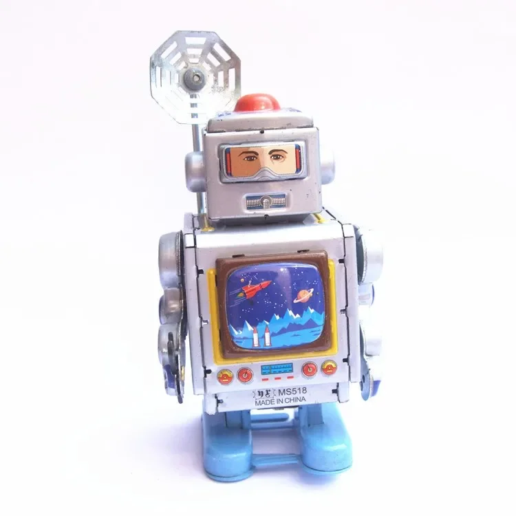 O astronauta robô Metal Walking Tin Toy para crianças, coleção clássica, relógio retro, mecânico, presente de Natal, engraçado