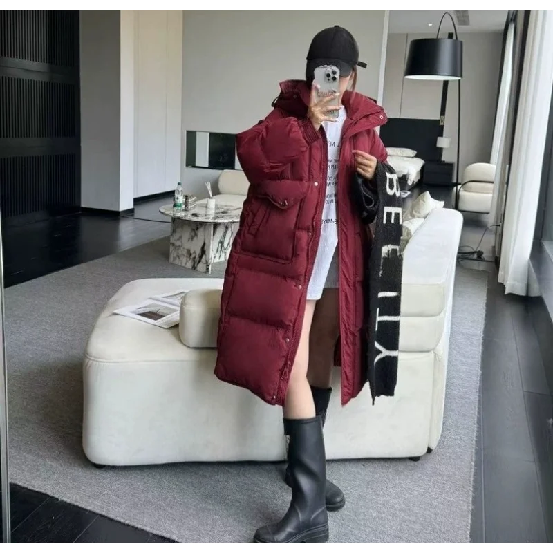 Chaqueta larga de plumón para mujer, moda de invierno 2025, estilo viajero, abrigo cálido adelgazante versátil y grueso elegante a la moda