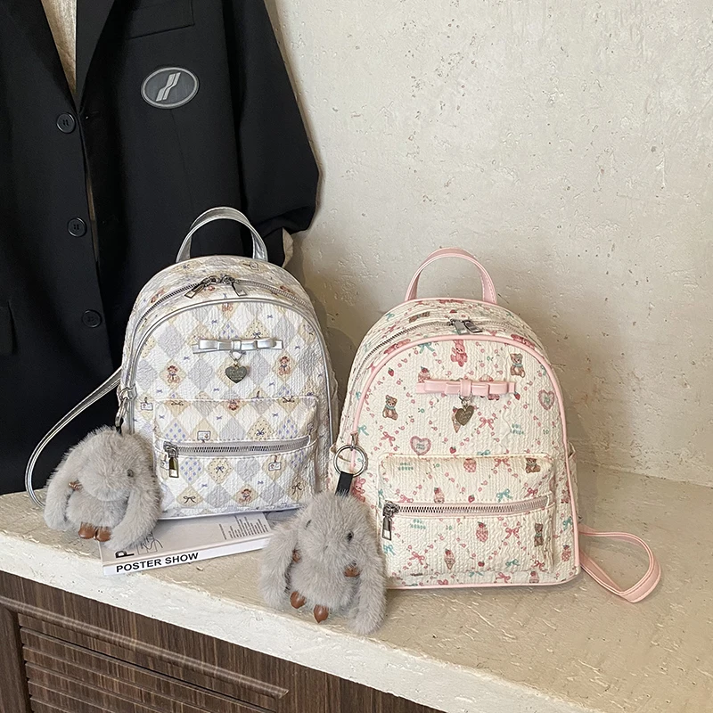 กระเป๋าเป้พิมพ์ลายหมีน่ารักสำหรับผู้หญิง 2025 ใหม่ กระเป๋าเดินทางลำลองความจุขนาดใหญ่ 6378XQ