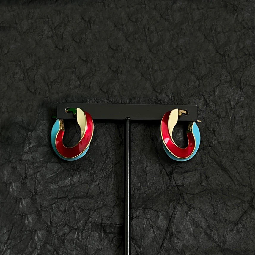 

Chic Twisted Hoop Earrings in Red & Blue with Gold Metallic Finish Glossy Surface Sleek Stylish Jewelry Accessory