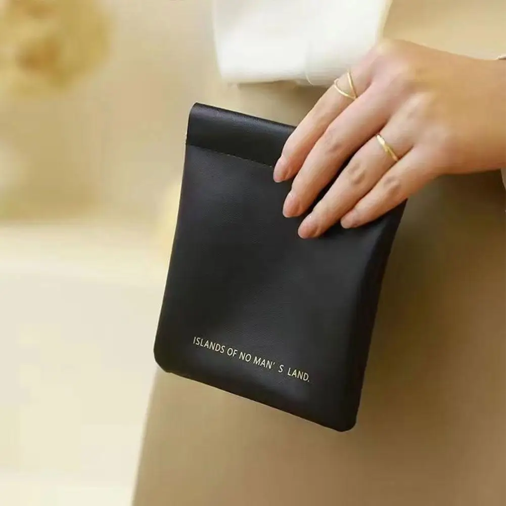 2025 Borsa per cosmetici per rossetto con schegge per donna Borsa per cosmetici portatile impermeabile e antipolvere in pelle PU Mini portamonete