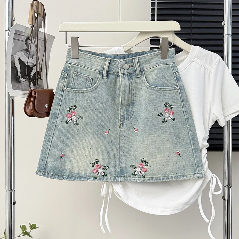 

Шикарная женская блестящая джинсовая короткая юбка с цветочной вышивкой и горячим тиснением, летняя облегающая мини-юбка с высокой талией и запахом на бедрах