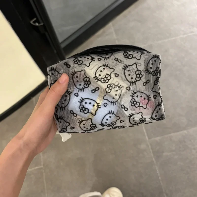 Neue Sanrio Hello Kitty Mesh-Material Kosmetik Aufbewahrungstasche Kreative tragbare Handtasche mit hoher Kapazität und Reißverschluss Niedliches Mädchenzubehör