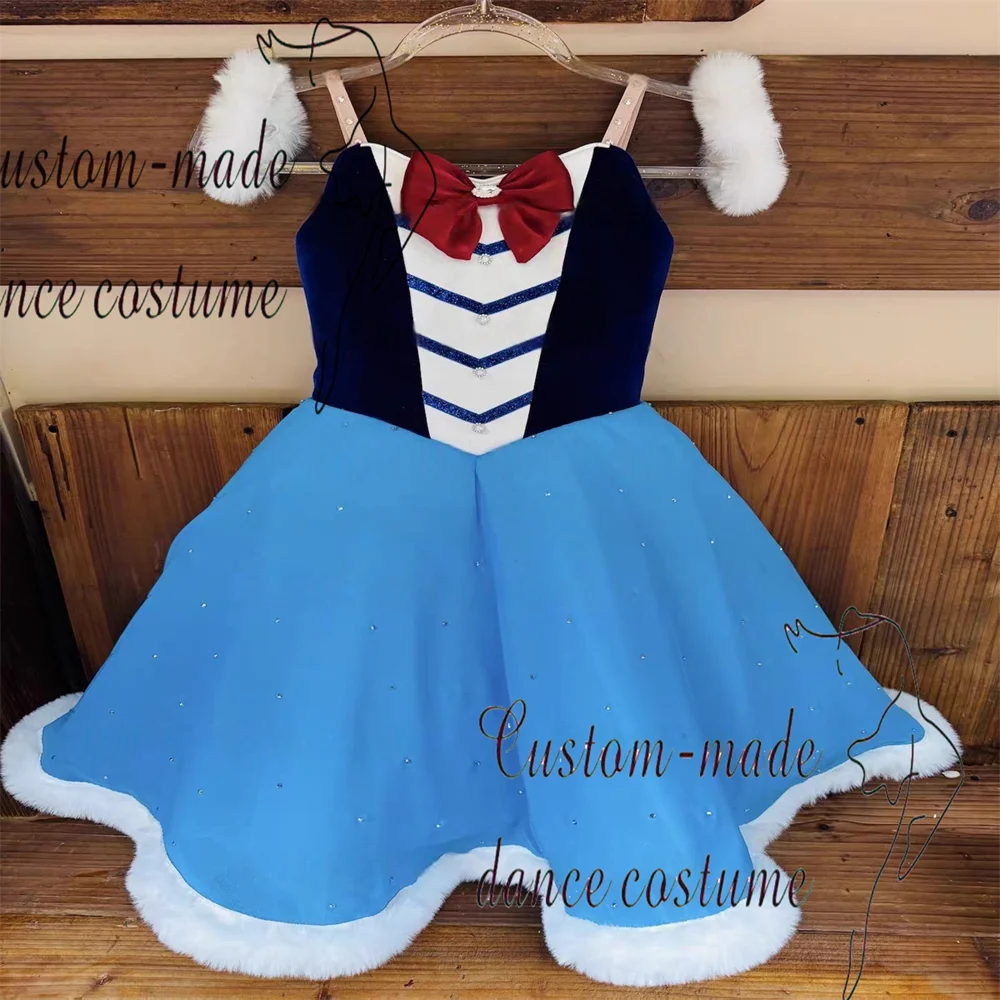 The rabbit drummer performs a variation of ballet in a blue and white plush tutu, accompanied by a rabbit hat.