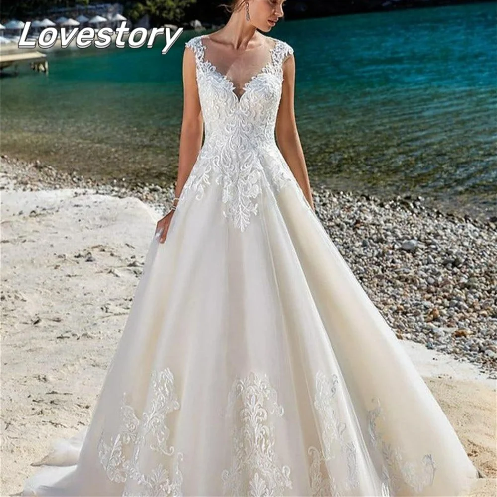 Beach A-Line Wedding DressesV Neck Sleeveless Illusion Button Wedding Dress Bridal Gown Applique Bride Robe Lace Robe De Mariée