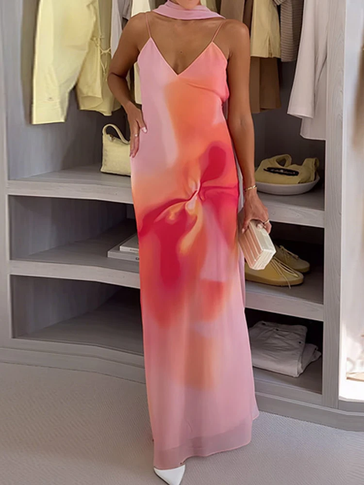 セクシーなVネックノースリーブホローアウトレディースドレスカジュアルボヘミアンビーチロングドレス2026春夏花柄プリントサスペンダードレス