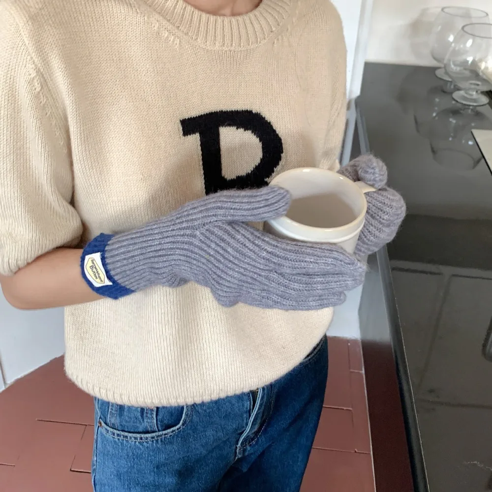 solid-color stretch-length gloves with two fingerless holes and touchscreen technology for college/skiing/morning workouts, etc