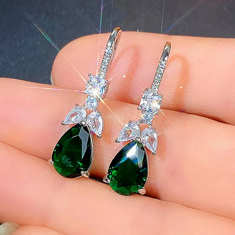 Huitan edle birnenförmige grüne Zirkonia Tropfen Ohrringe Frauen elegante Hochzeits feier Ohr Zubehör schönes Geschenk neuen Schmuck