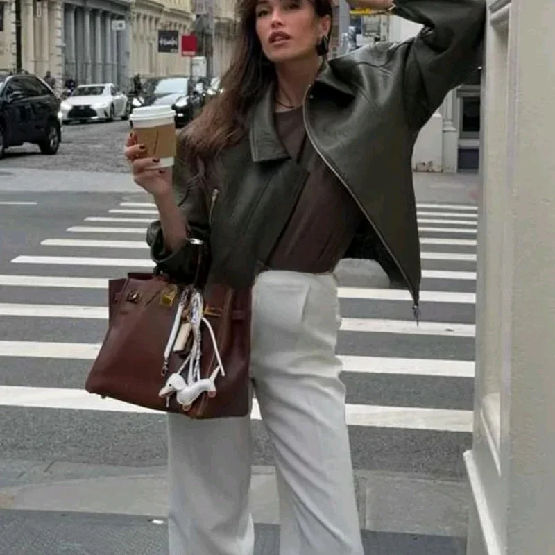 خريف جديد Sle المرأة الرجعية الرياح طوق طويل Sve سستة فضفاضة بولي Leather الجلود Jaet ملابس خارجية ألياف البوليستر تخفيف Sle
