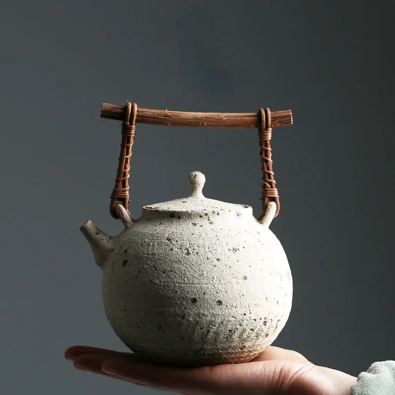 

Chinese-style ceramic handmade teapot kettle with wooden handle and beam pot stoneware fire-resistant teapot tea set